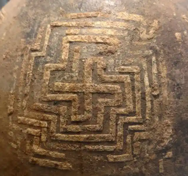 Swastika cross on a 9th Century BC jug